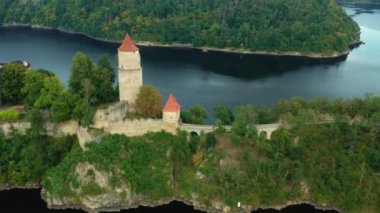 Camera side moving along Zvikov Castle on the hill surrounded by river Vltava and Otava in South Bohemia region in Czech Republic