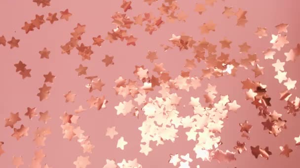 Golden Balloons Shape Zero Falls Pink Floor Scattered Stars Confetti — Vídeo de Stock