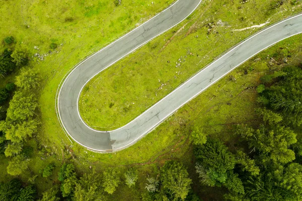 stock image Snake Road driveway in the majestic Alpine mountains is a stunningly picturesque and winding route