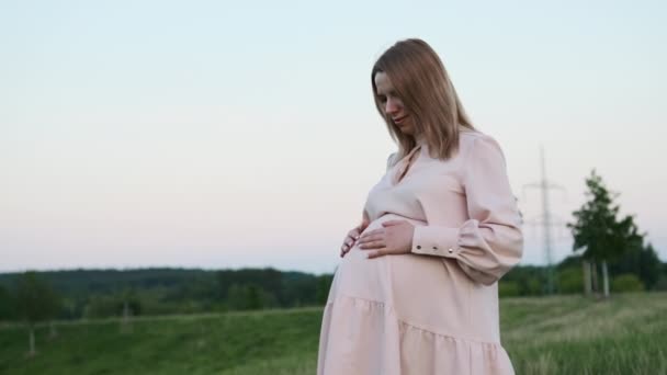 Young Woman Gently Strokes Gazing Belly Anticipation Future Child Standing — Stock Video