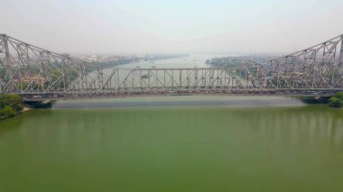 Aerial view of Howrah Bridge, This is a balanced steel bridge over the Hooghly River in West Bengal, India. clipart