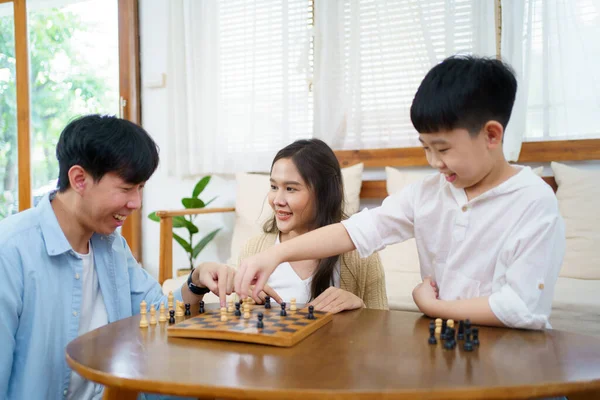 Happy Asian Lovely Family Staying Playing Chess Game Together Living — стоковое фото