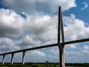 The Atlantic Bridge, a double-pylon, double-plane bridge with a main span of 1,740 ft crosses the panama canal.