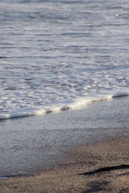 sea foam on the beach shore