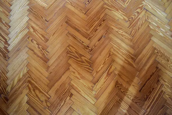 detail of the plot of a pinewood parquet floor