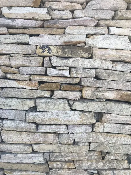 stone cladding on the facade of a house