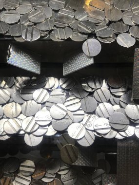 coins from a coin cascade machine clipart