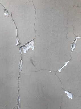 cracked plaster of an old wall