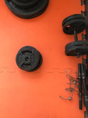 detail of weights in the gym clipart