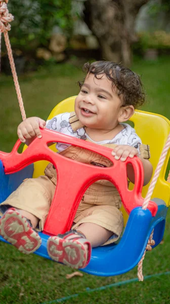 stock image cute little boy playing with a toy car