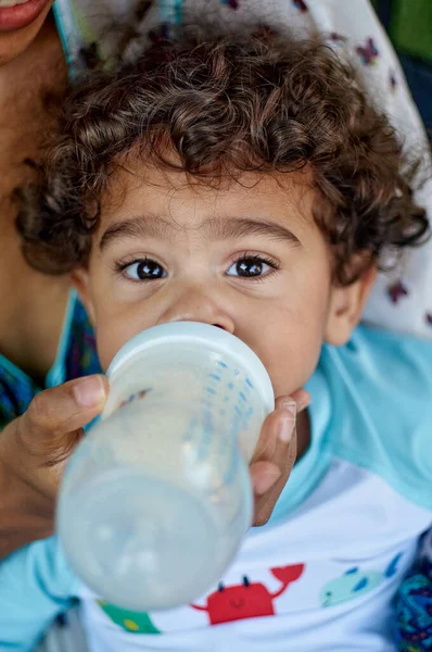 Stock image boy drinking water from a bottle