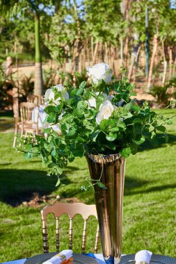 beautiful flowers decoration for a wedding ceremony, in the garden.