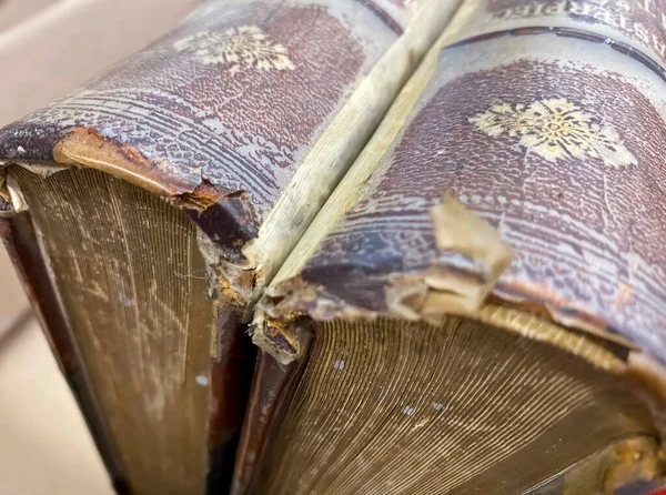 Antique Books with Torn Edges