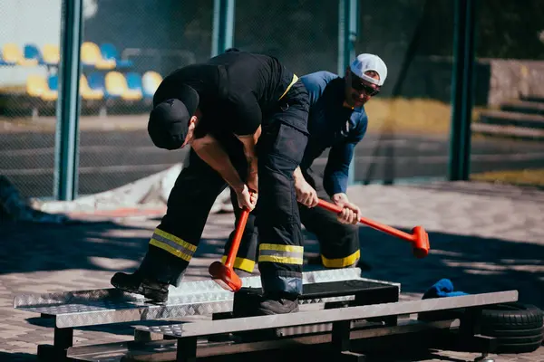 Firefighters Hammers Training Sports Ground — Stock Photo, Image