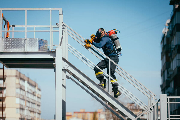 Male Firefighter Oxygen Balloon Training Sports Ground Royalty Free Stock Photos