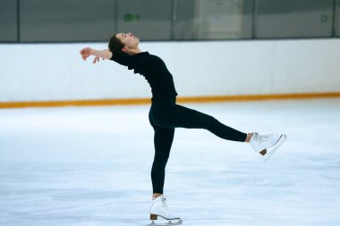 Figure skater girl on ice. clipart