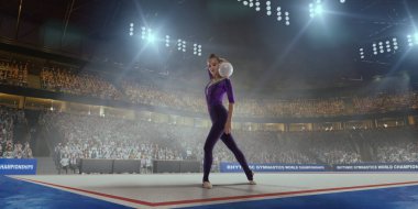 Profesyonel 3 boyutlu jimnastik stadyumundaki ritmik jimnastik kızı..