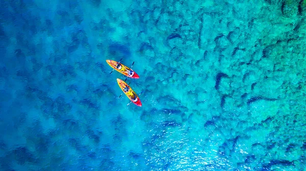 stock image Kayaking. Aerial view of floating kayaks and people on blue sea at sunny day. Travel and active life image. Summertime vacation. Mediterranean sea.