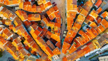 Rovinj, Croatia. Aerial view. Old historic buildings in the bay. Harbor with boats. Beautiful romantic old town of Rovinj during sunset, Istrian peninsula, Croatia, Europe.