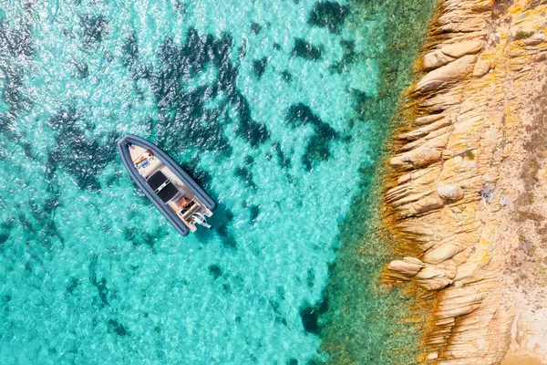 stock image Drone view of a motor boat. Luxury transportation. Vacationing people. Vacation and holidays. Summer time for sea travel. The sea bay. Photo for background and wallpaper. Mediterranean Sea.