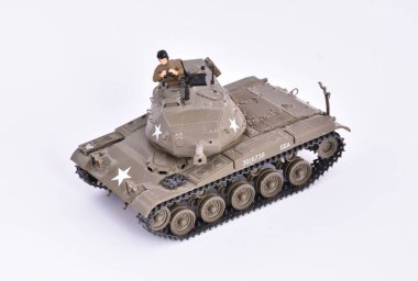 Plastic toy, completed and painted model for gluing. American tank from World War 2, M41 A3 Walker Bulldog. clipart