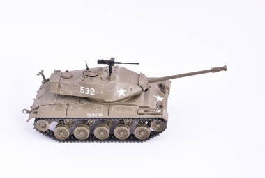 Plastic toy, completed and painted model for gluing. American tank from World War 2, M41 A3 Walker Bulldog. clipart