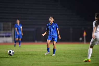 BURIRAM, THAILAND - 10 Mart 2023: Jidapha Damri # 16 Tayland Oyuncusu Tayland 'ın Buriram şehrinde Tayland' a karşı Tayland 'da Tayland' a karşı 20 Kadın Kupası