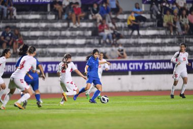 BURIRAM, THAILAND - 10 Mart 2023: Praewa Nudnabee # 8 Tayland Oyuncusu, Tayland 'ın Buriram şehrinde Tayland' a karşı Tayland 'da Tayland' a karşı 20 kadın kupasında eylem halinde.