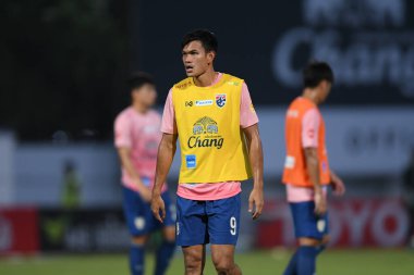 CHONBURI, THAILAND - 24 Mart 2022 Adisak Kraisorn # 9 Tayland dostluk maçı sırasında Chonburi Stadyumu 'nda Nepal' e karşı  