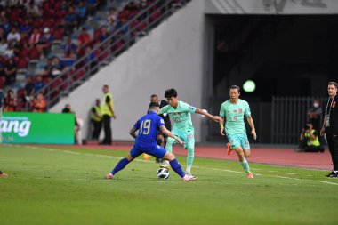 BANGKOK, THAILAND - 16th NOVEMBER, 2023: Wei Shihao # 20 Dünya Kupası sırasında Tayland ile Tayland arasında Tayland ile Tayland arasında Tayland Stadyumu, Tayland