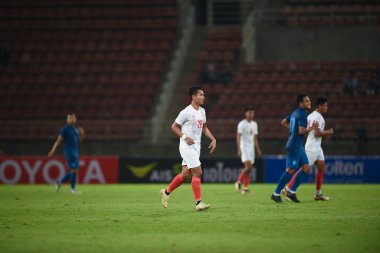 PATUMTHANI, THAILAND - 11 Aralık 2022 Nyfin Chan # 28 Myanmar oyuncusu Tayland 'daki Tayland Stadyumu' nda Myanmar 'a karşı oynanan dostluk maçı sırasında