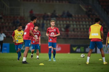 PATHUMTHANI, THAILAND -11 DECEMBER, 2022:Theerathon Bunmathan #3 Player of thailand during friendly match between thailand against myanmar at thammasart stadium , thailand clipart