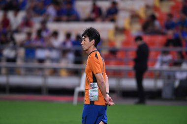 Bangkok, Tayland - 26 Mart 2024: Tayland Dünya Kupası 'nda Masatada Ishii' nin baş antrenörü, Tayland 'daki Rajamangkala Stadyumu' nda Güney Kore maçına çıktı.    