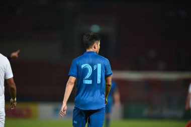 PATHUMTHANI, THAILAND -11 Aralık 2022: Poramet Arjvilai # 21 Tayland ile Tayland arasındaki dostluk maçı sırasında Tayland 'daki Tayland Stadyumu' nda Myanmar 'a karşı
