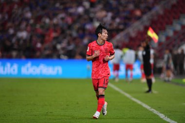 Bangkok, Tayland - 26 Mart 2024: Tayland 'daki Rajamangala Stadyumu' nda Tayland ile Güney Kore arasında oynanan Dünya Kupası sırasında Güney Kore 'nin 15 numaralı oyuncusu Kim Moonhwan.