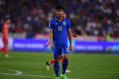 Bangkok, Thailand - March 26, 2024:Suphanut Meuanta #10 Player of Thailand during World Cup qualified between Thailand against South Korea at Rajamangkala stadium, Thailand. clipart