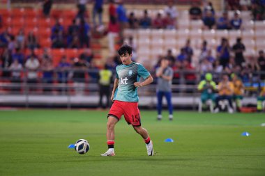 Bangkok, Tayland - 26 Mart 2024: Tayland 'daki Rajamangala Stadyumu' nda Tayland ile Güney Kore arasında oynanan Dünya Kupası sırasında Güney Kore 'nin 15 numaralı oyuncusu Kim Moonhwan.