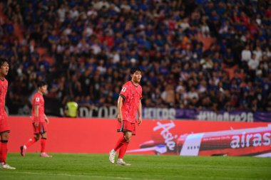 Bangkok, Tayland - 26 Mart 2024: Dünya Kupası sırasında Güney Kore 'nin 5 numaralı Park Jin-Seob oyuncusu, Tayland' daki Rajamangkala Stadyumu 'nda Güney Kore' ye karşı mücadele etti.