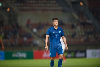 PATHUMTHANI, THAILAND -11 Aralık 2022: Poramet Arjvilai # 21 Tayland ile Tayland arasındaki dostluk maçı sırasında Tayland 'daki Tayland Stadyumu' nda Myanmar 'a karşı