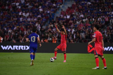 Bangkok, Tayland - 26 Mart 2024 - Dünya Kupası sırasında Güney Kore 'nin 3 numaralı Kim jin-su oyuncusu Rajamangkala Stadyumu' nda Güney Kore 'ye karşı mücadele etti.