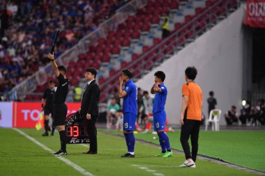Bangkok, Tayland - 26 Mart 2024: Dünya Kupası sırasında Suphanut Meuanta # 10 Tayland Kupası 'nda Güney Kore ile Tayland' daki Rajamangkala Stadyumu 'nda karşılaştı..