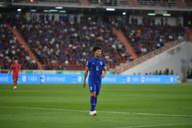 BANGKOK, THAILAND-26 MARCH, 2024: Sarach Yooyen # 6 Tayland Dünya Kupası sırasında Tayland ile Tayland arasında Tayland rajamangkala Stadyumu 'nda oynanan karşılaşmaya hak kazandı.