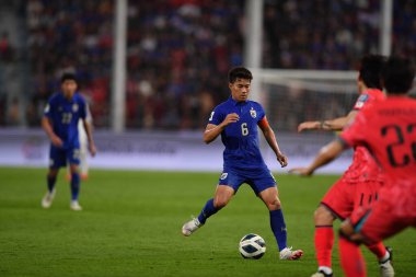 BANGKOK, THAILAND-26 MARCH, 2024: Sarach Yooyen # 6 Tayland Dünya Kupası sırasında Tayland ile Tayland arasında Tayland rajamangkala Stadyumu 'nda oynanan karşılaşmaya hak kazandı.