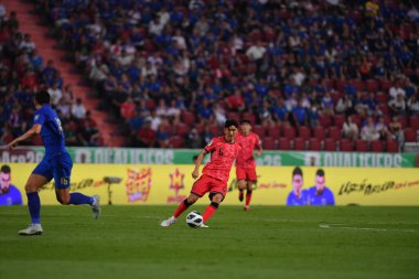 BANGKOK, THAILAND-26 MARCH, 2024: Hwang Inbeom # 6 Güney Kore Futbolcusu Tayland ile Güney Kore arasında Tayland rajamangkala Stadyumu, Tayland