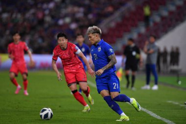 BANGKOK, THAILAND-26 MARCH, 2024: Tayland Dünya Kupası sırasında Tayland ile Tayland arasında oynanan 21 numaralı Supphanan Burirat