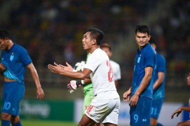PATUMTHANI, THAILAND - 11 Aralık 2022 Nyfin Chan # 28 Myanmar oyuncusu Tayland 'daki Tayland Stadyumu' nda Myanmar 'a karşı oynanan dostluk maçı sırasında