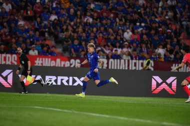 BANGKOK, THAILAND-26 MARCH, 2024: Tayland Dünya Kupası sırasında Tayland ile Tayland arasında oynanan 21 numaralı Supphanan Burirat