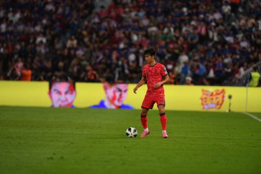 Bangkok, Tayland - 26 Mart 2024 - Dünya Kupası sırasında Güney Kore 'nin 3 numaralı Kim jin-su oyuncusu Rajamangkala Stadyumu' nda Güney Kore 'ye karşı mücadele etti.