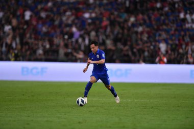 Bangkok, Tayland - 26 Mart 2024: Dünya Kupası sırasında Suphachok Sarachat # 7 Tayland Millî Futbol Takımı, Tayland 'daki Rajamangala Stadyumu' nda Güney Kore 'ye karşı mücadele etti.. 