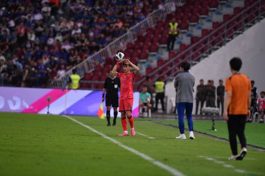 Bangkok, Tayland - 26 Mart 2024 - Dünya Kupası sırasında Güney Kore 'nin 3 numaralı Kim jin-su oyuncusu Rajamangkala Stadyumu' nda Güney Kore 'ye karşı mücadele etti.